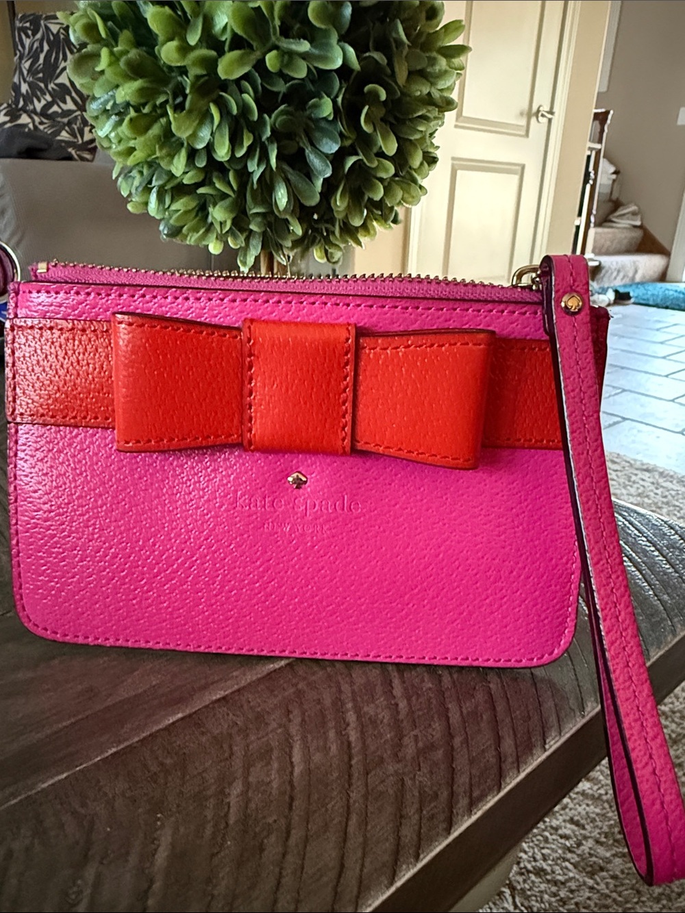 kate spade Kirk Park pink wristlet with red bow accent - NWOT